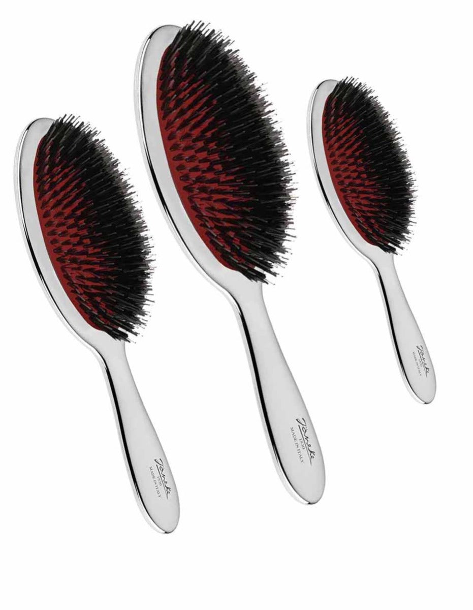Chrome hairbrush with mixed bristles