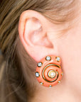 Coral Snail Clip-on Earrings